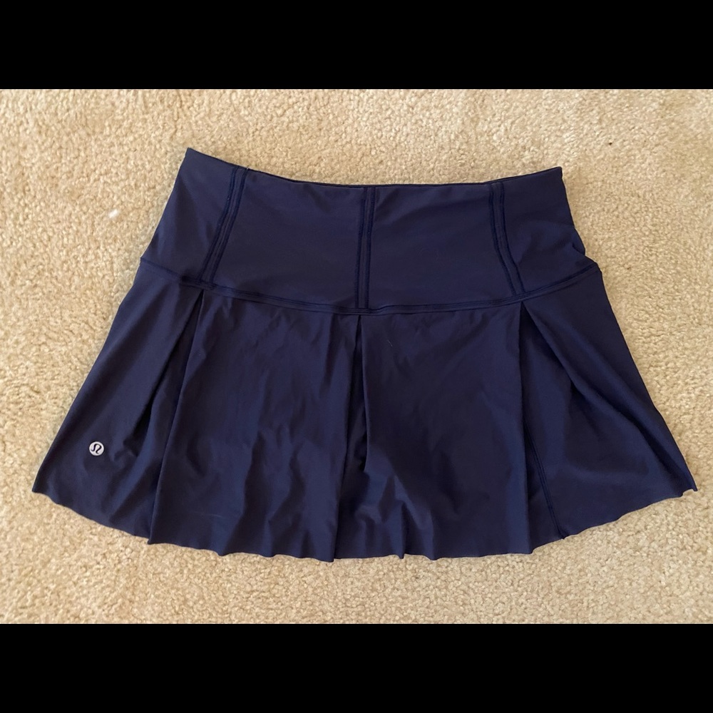 Excellent condition Navy size 6 LuLu tennis skirt. Super cute and comfy!